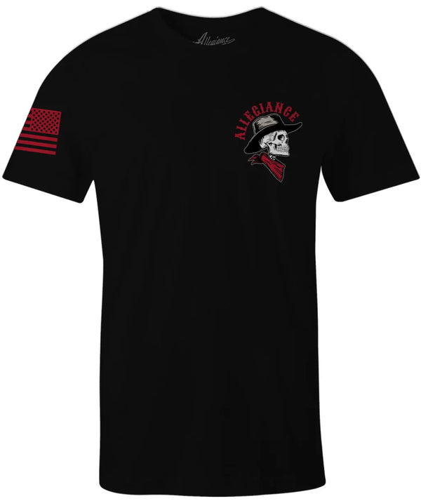 Front of Cowboy Tee in black featuring small skeleton cowboy head graphic and American flag printed on the sleeve.