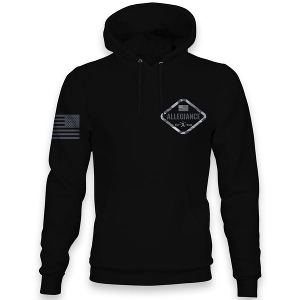 Front view of Allegiance Hex Camo Hoodie in black with small hex camo logo and tonal American flag on sleeve